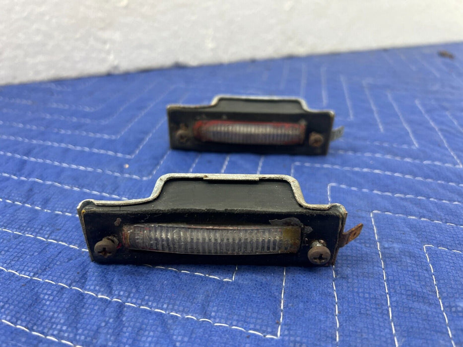 1983-1985 Porsche 944 Hella License Plate Light Lamp Assembly Pair OEM #1804EM