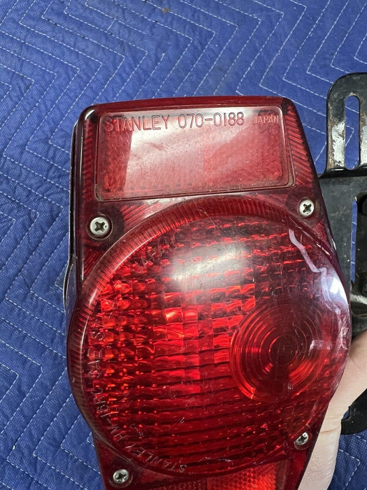 1974 Honda CB450 CB550 Rear Tail Light Assembly & Bracket Lens Stanley OE #3488E