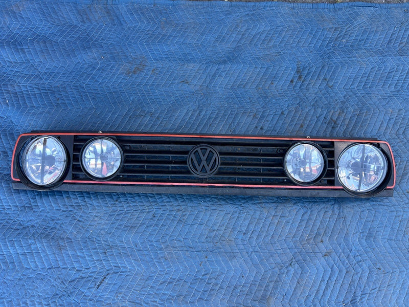 1985-1992 Volkswagen Golf Grille Red Stripe w/ Headlights 191853653 OEM