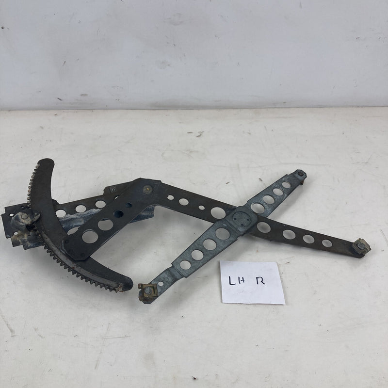 1981-1985 Volvo 240 245 Left Rear Manual Window Regulator 1255052 OEM