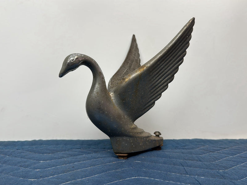 - Hood Ornament