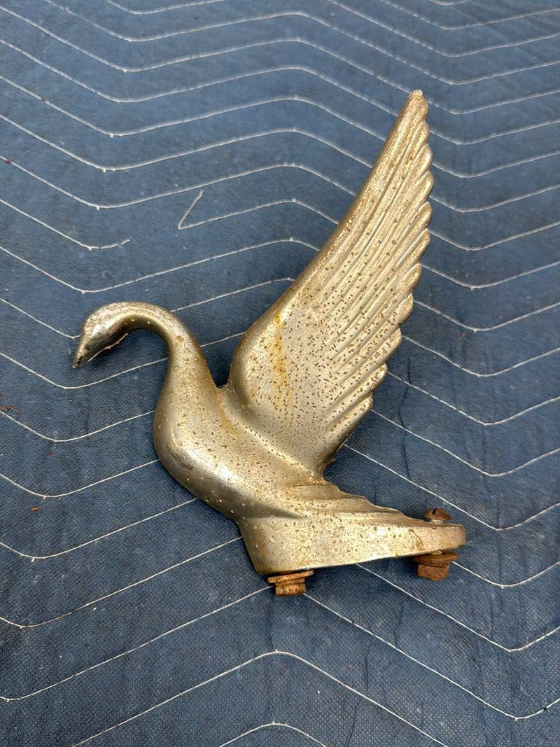 - Hood Ornament