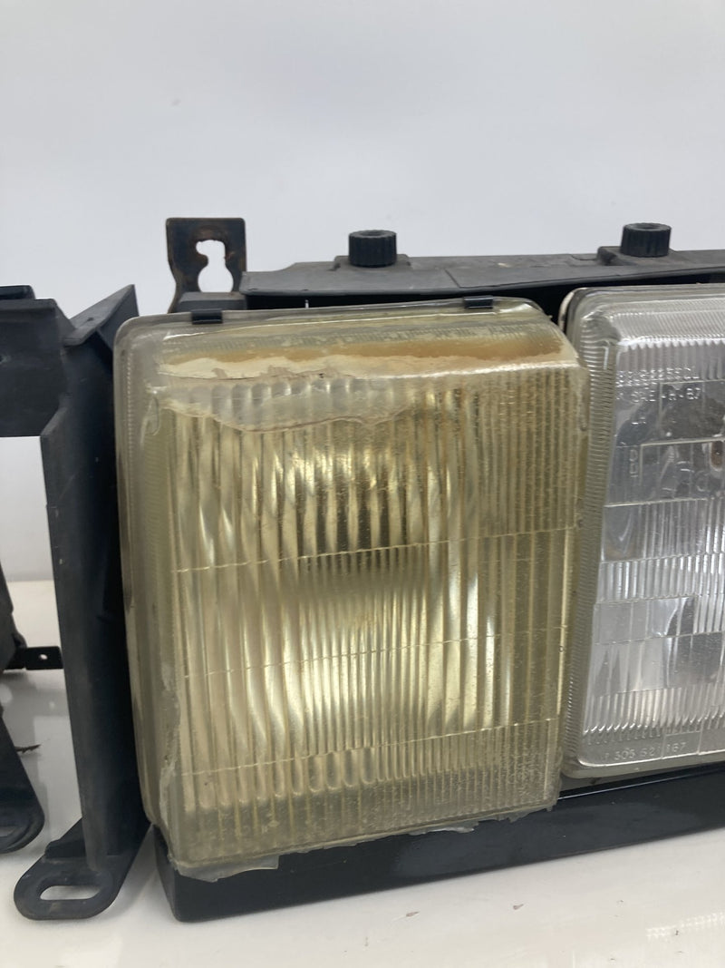 1992 Volvo 940 944 - Headlight PN: LE2255DR LE2255DL