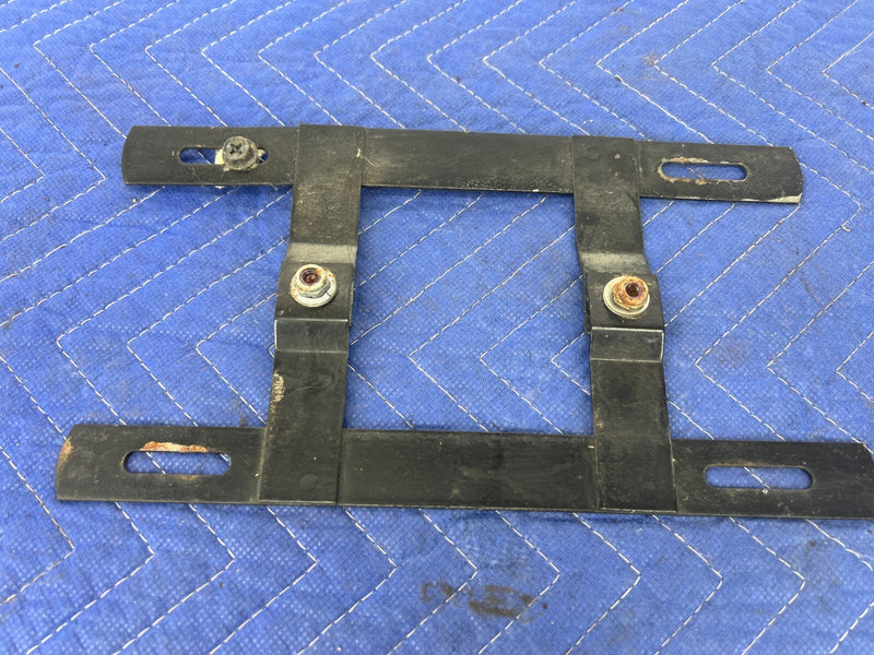 1983-1985 Porsche 944 License Plate Tag Holder Mounting Bracket OEM #1819EM