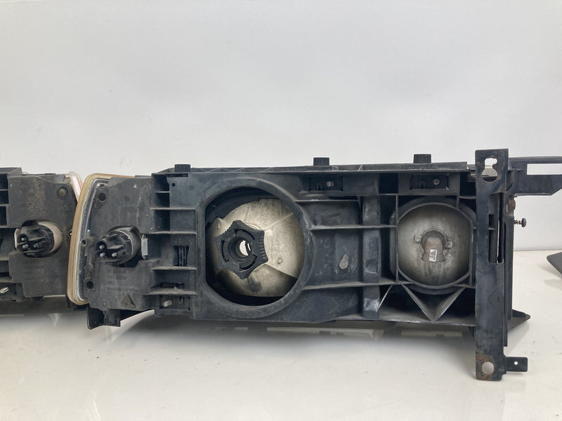 1992 Volvo 940 944 - Headlight PN: LE2255DR LE2255DL