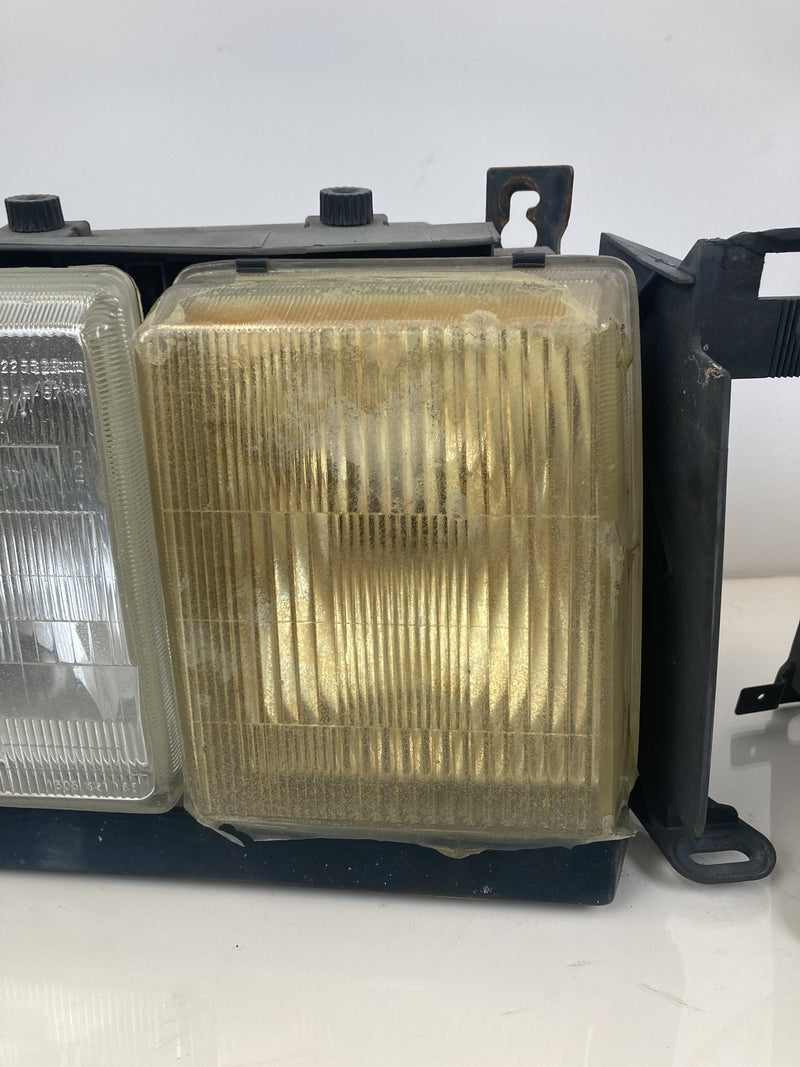 1992 Volvo 940 944 - Headlight PN: LE2255DR LE2255DL