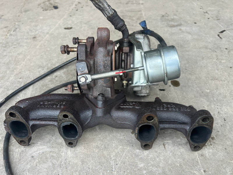 1985-1992 Volkswagen Golf Turbocharger w/ Exhaust Manifold GT1544S 023253033 OEM