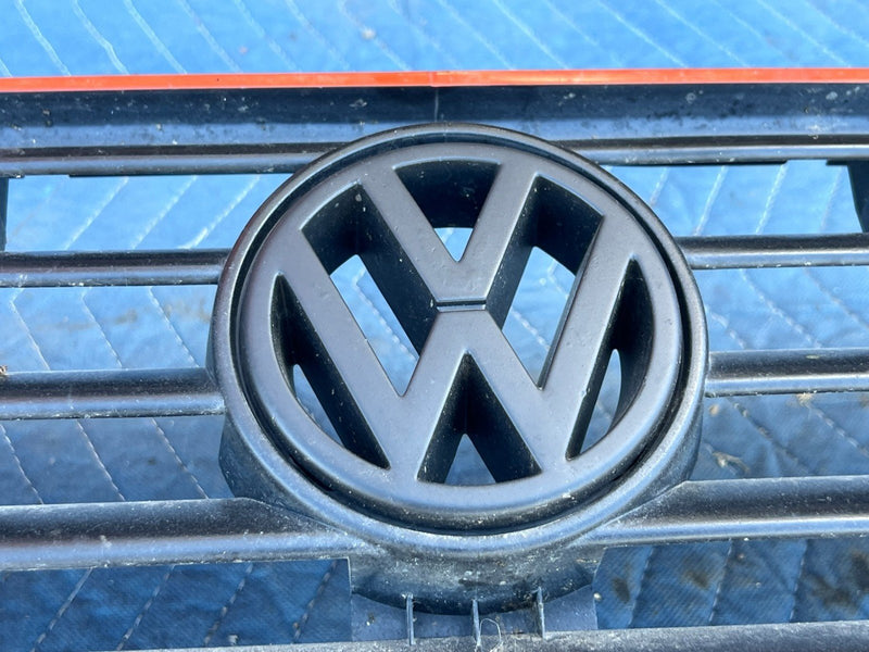 1985-1992 Volkswagen Golf Grille Red Stripe w/ Headlights 191853653 OEM