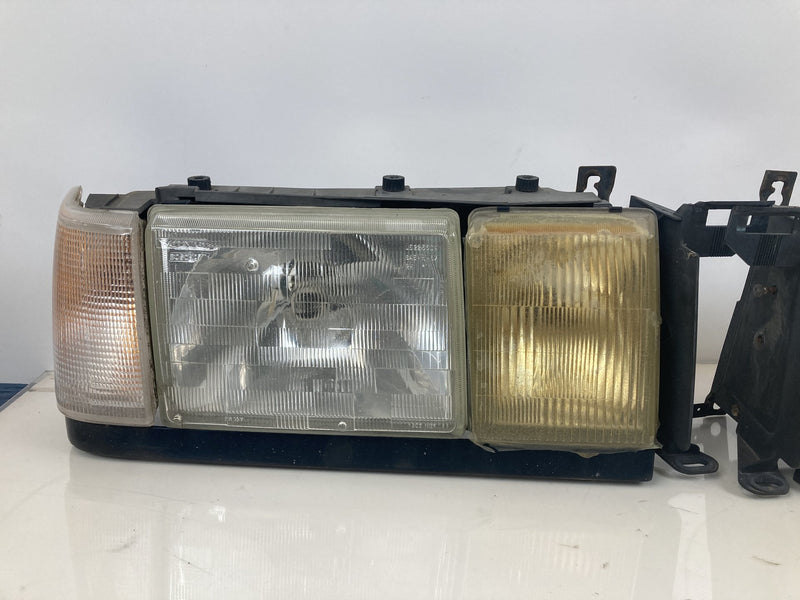 1992 Volvo 940 944 - Headlight PN: LE2255DR LE2255DL