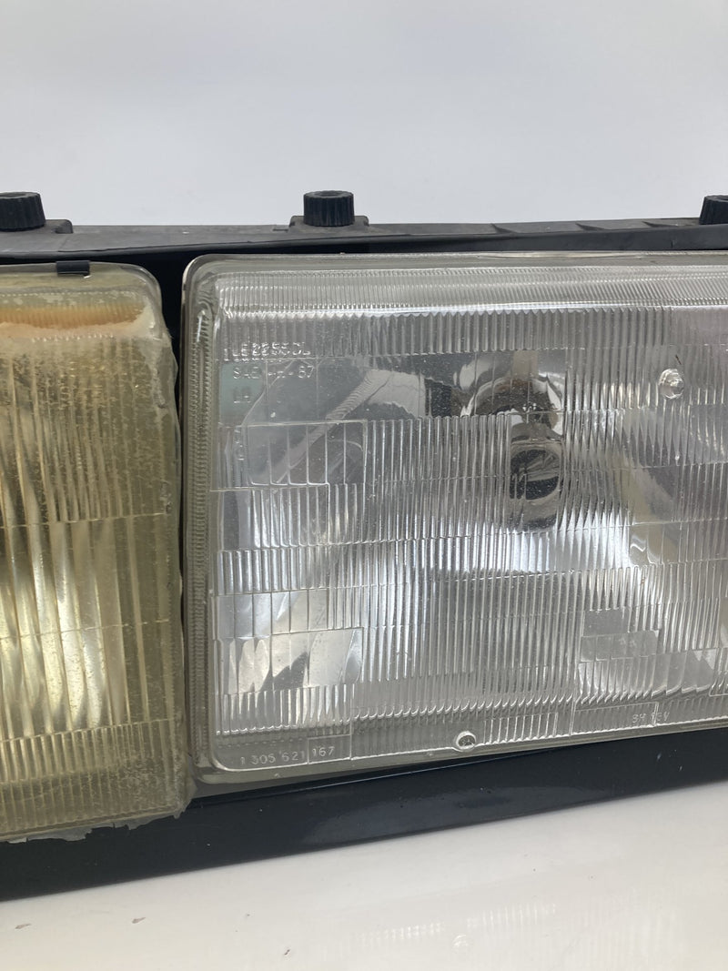 1992 Volvo 940 944 - Headlight PN: LE2255DR LE2255DL