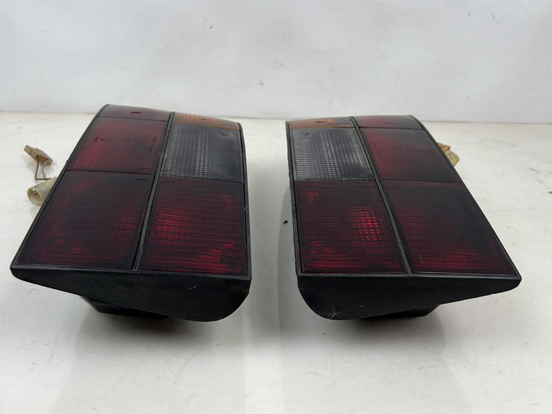 1983-1985 Porsche 944 Smoked RH LH Tail Light Lamp Pair OEM #5539EM