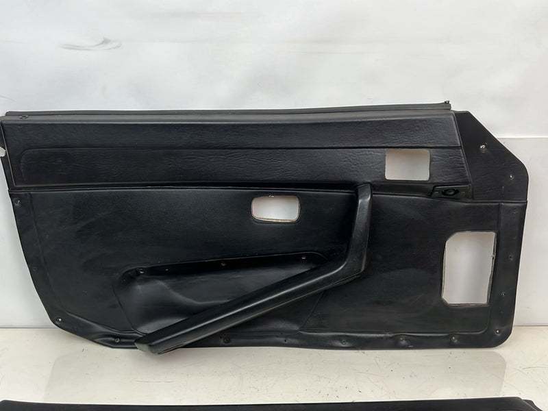 1983-1985 Porsche 944 Left + Right Door Card Panel Pair Black OEM #5706EM