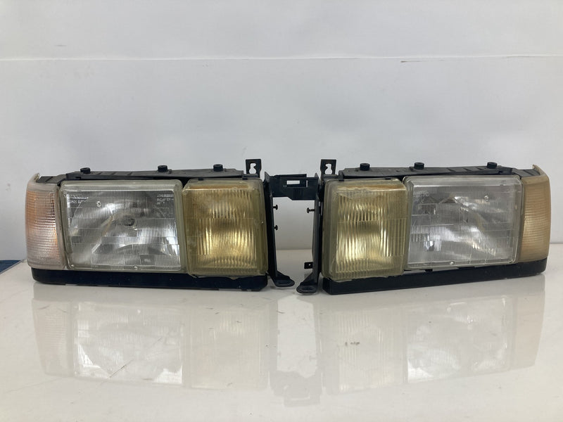 1992 Volvo 940 944 - Headlight PN: LE2255DR LE2255DL