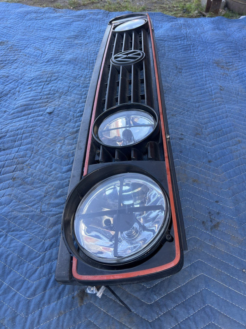 1985-1992 Volkswagen Golf Grille Red Stripe w/ Headlights 191853653 OEM