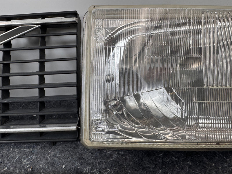1975-1985 Volvo 240 TV Screen Headlight Set w/Flat-hood Eggcrate Grille 1246618
