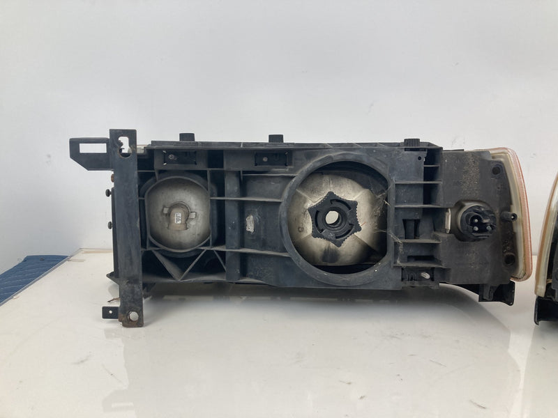 1992 Volvo 940 944 - Headlight PN: LE2255DR LE2255DL