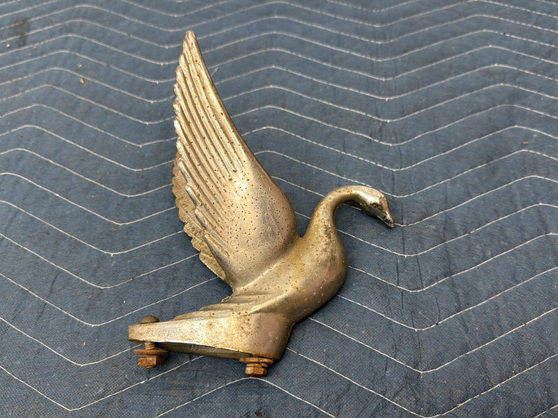 - Hood Ornament