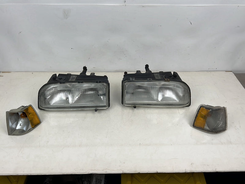 1993-1997 Volvo 850 Left & Right Headlight Assembly w/ Turn Signal Set OEM