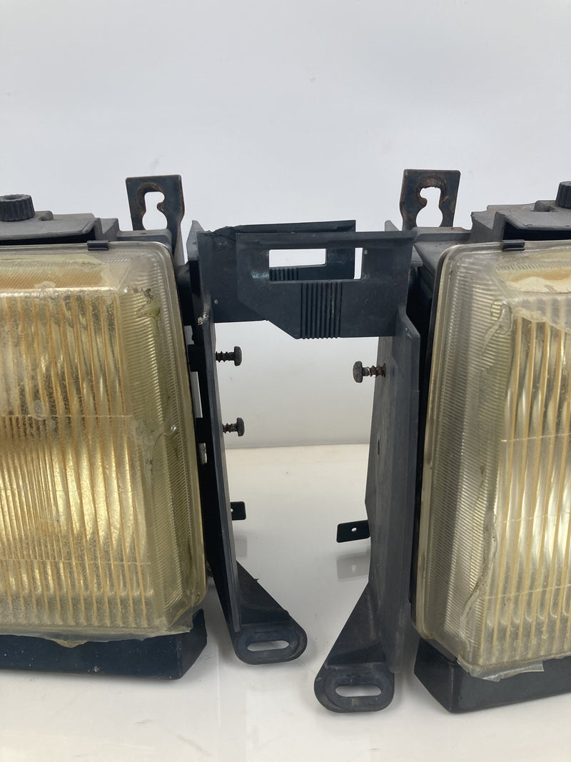 1992 Volvo 940 944 - Headlight PN: LE2255DR LE2255DL