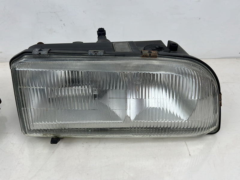 1993-1997 Volvo 850 Left & Right Headlight Assembly w/ Turn Signal Set OEM