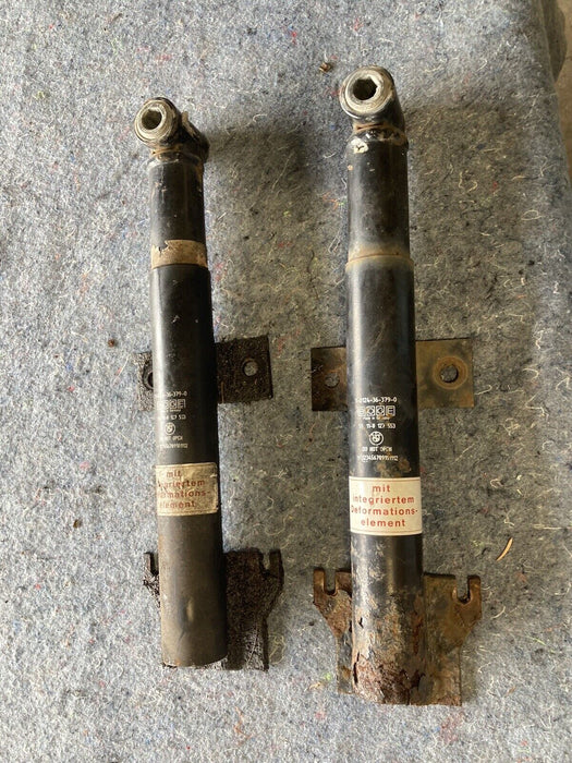 1986-1994 BMW 7 Series E32 Bumper Shocks Mounts Pair Struts 127553 OEM #811M