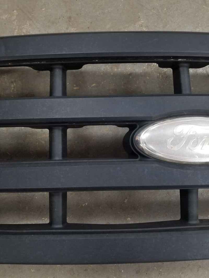 1999-2004 FORD F-350 POWERSTROKE OEM FRONT PLASTIC GRILL BLACK PLASTIC #CN621